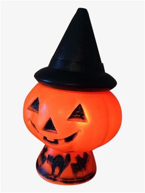 Create an Enchanting Ambiance with a Lighted Pumpkin and Witch Hat String Lights